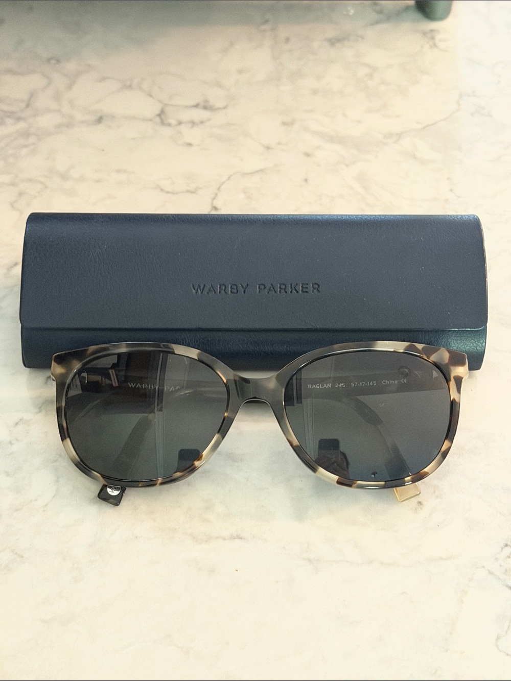 Warby Parker Tortoise Shell Sunglasses with Dark Gray Lenses
